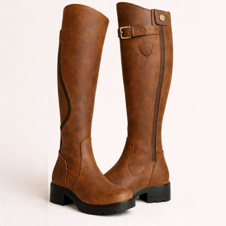 Women's knee-high boots with buckle strap, side zipper and lug sole