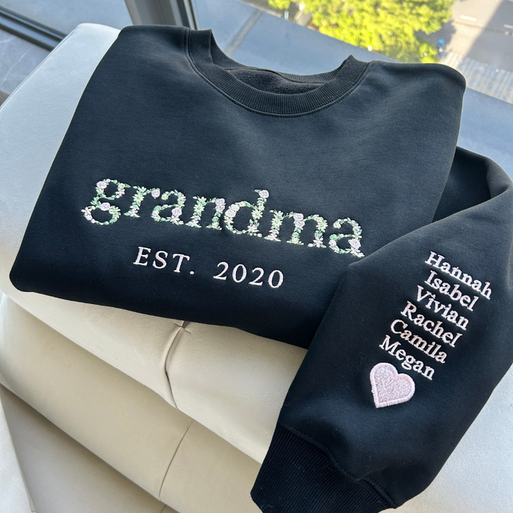 Personalized embroidered crew neck sweatshirt with floral name design