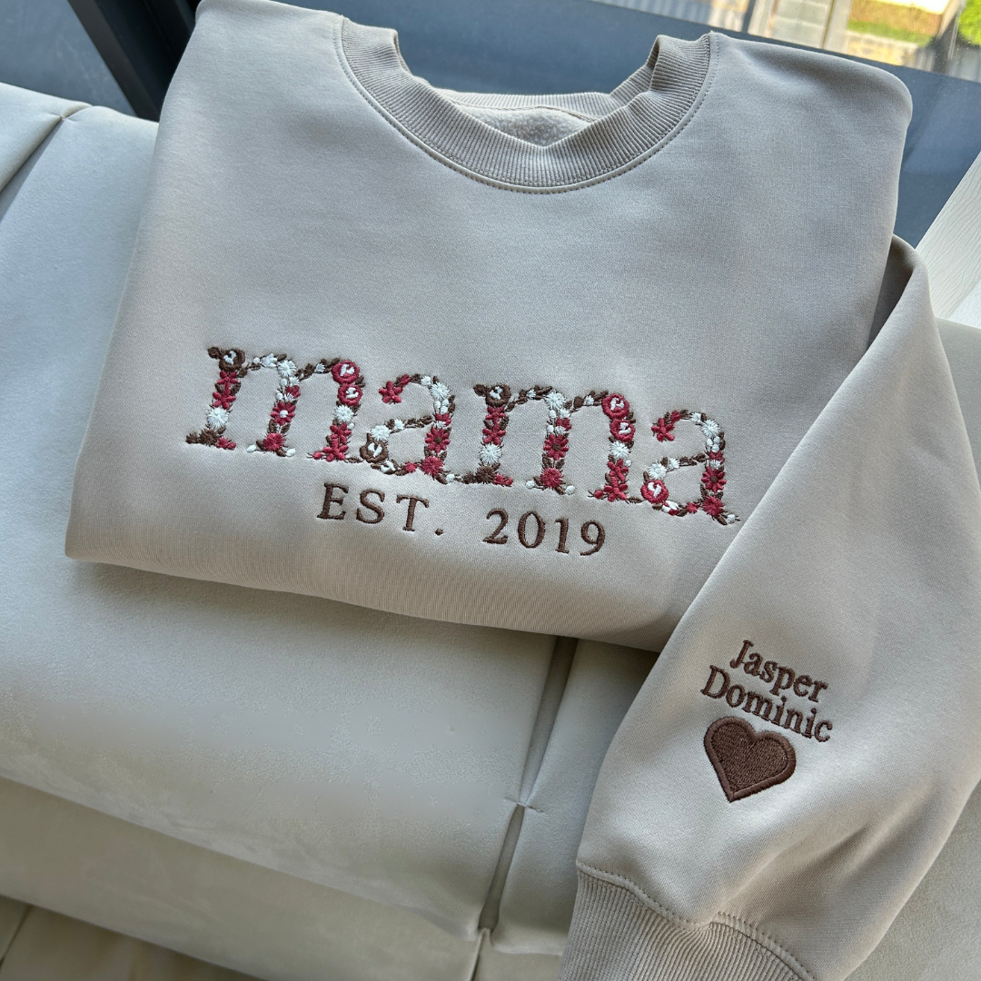 Personalized embroidered crew neck sweatshirt with floral name design