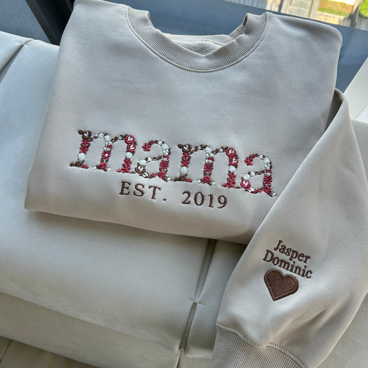 Personalized embroidered crew neck sweatshirt with floral name design