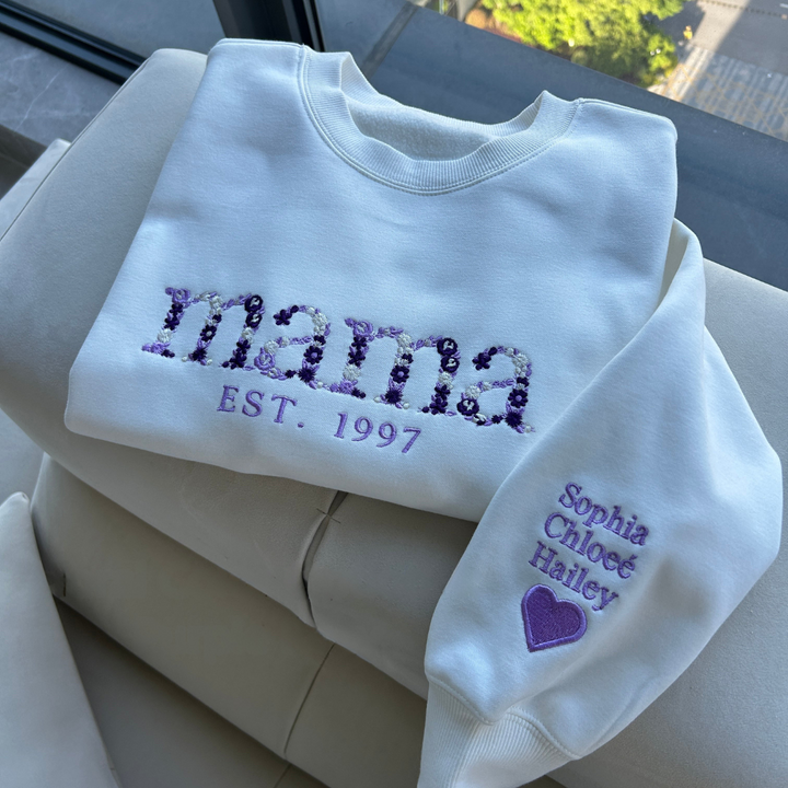 Personalized embroidered crew neck sweatshirt with floral name design