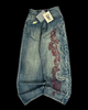 Blue men's jeans with embroidered side graphic and distressed detail