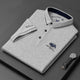 Men's short-sleeve polo shirt with contrast trim and embroidered chest detail