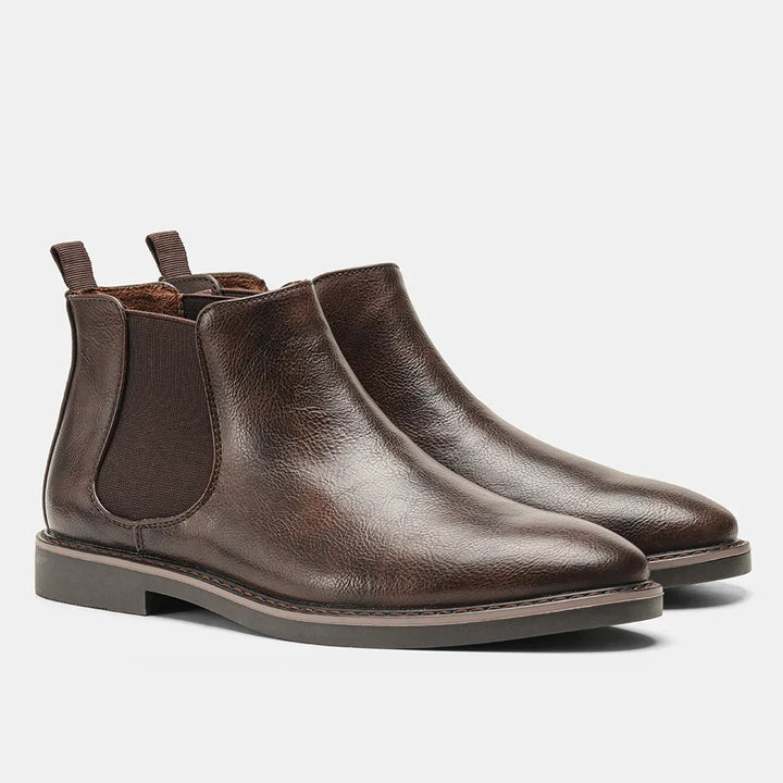 Chelsea ankle boots with elastic side panels, rear pull tabs and low heels