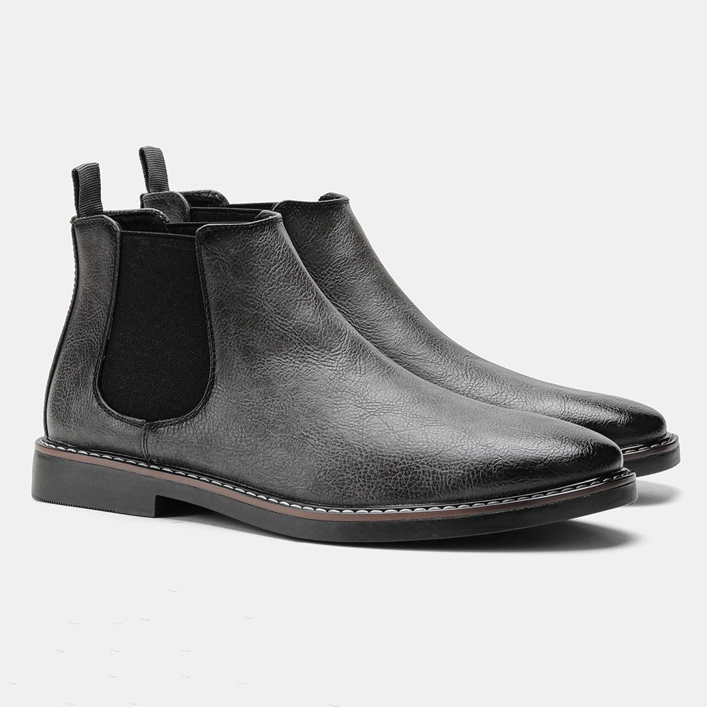 Chelsea ankle boots with elastic side panels, rear pull tabs and low heels