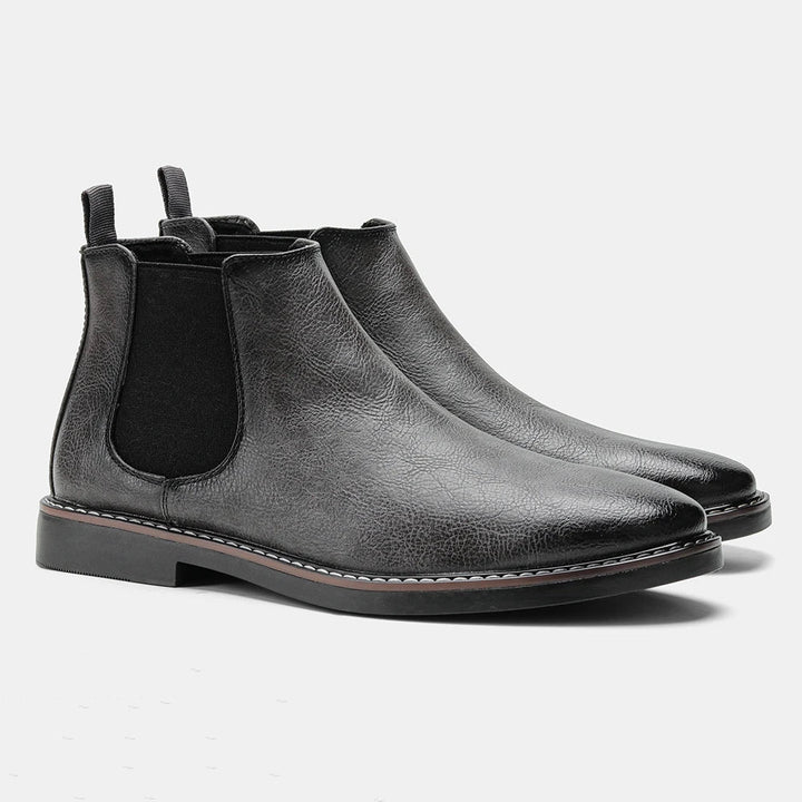 Chelsea ankle boots with elastic side panels, rear pull tabs and low heels