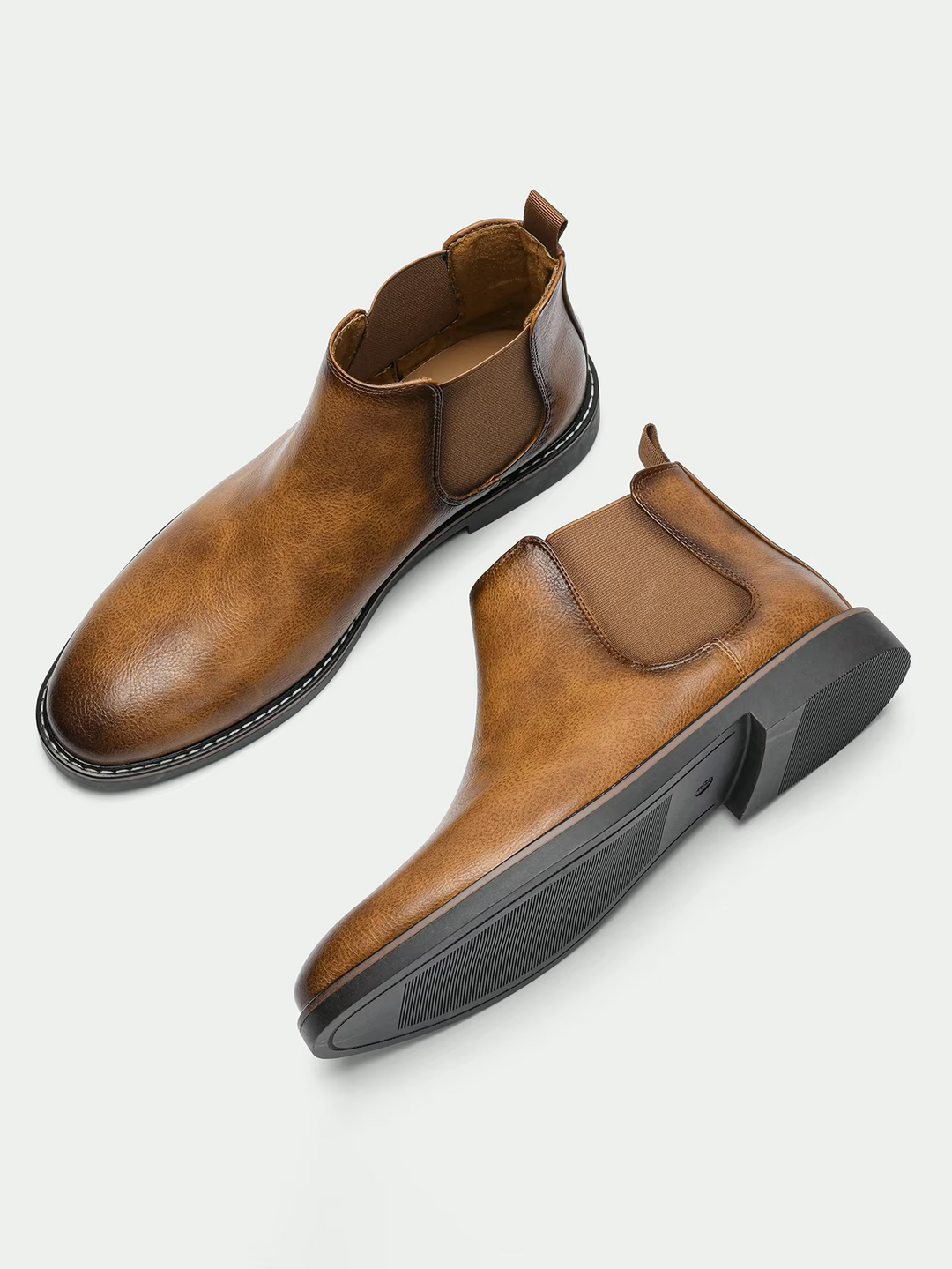 Chelsea ankle boots with elastic side panels, rear pull tabs and low heels