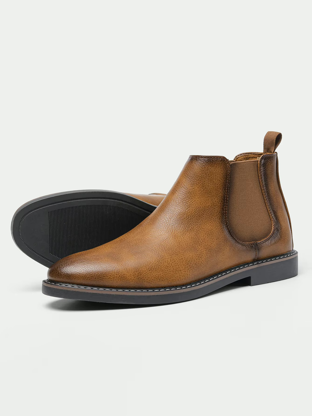 Chelsea ankle boots with elastic side panels, rear pull tabs and low heels