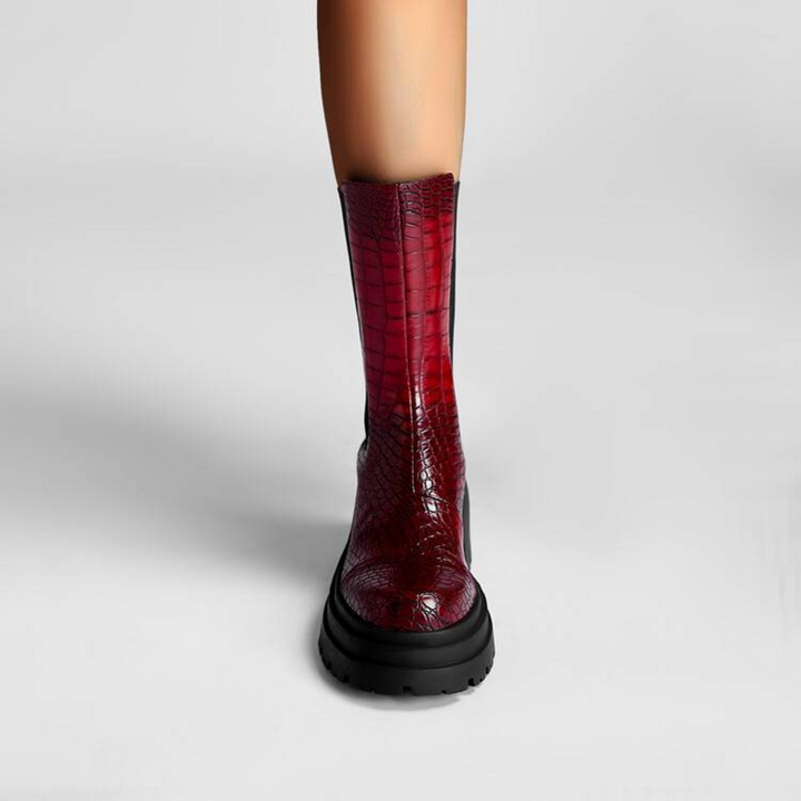 Women's pull-on ankle boots with textured upper and black lug sole
