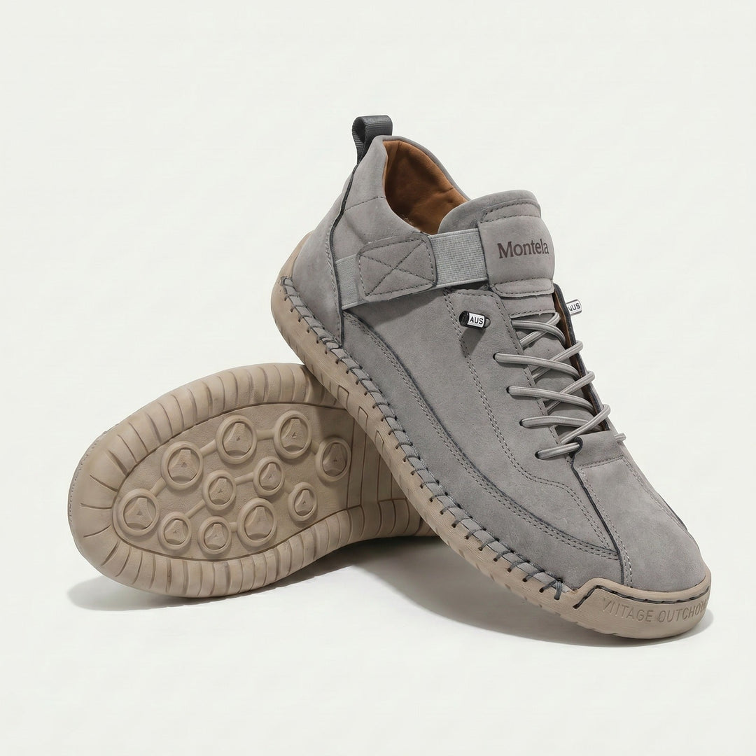 High-top lace-up sneakers with stitched panels, side strap detail and textured flat soles