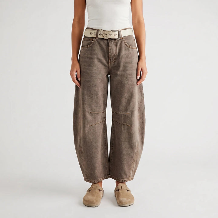 Women's cropped wide-leg jeans with curved legs and knee seam detailing