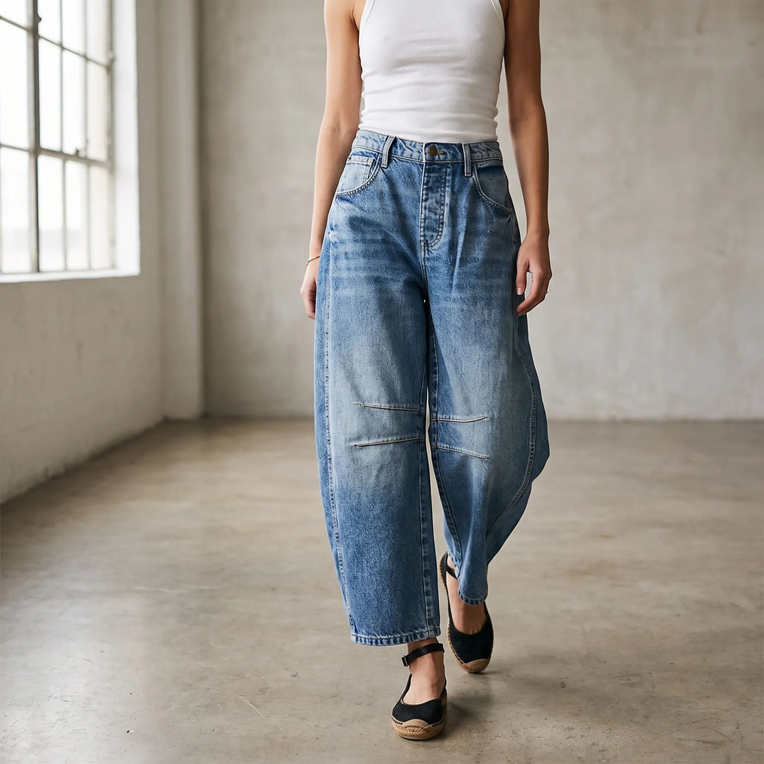 Women's cropped wide-leg jeans with curved legs and knee seam detailing