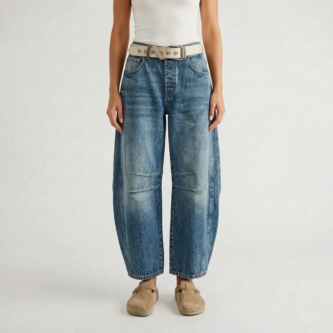 Women's cropped wide-leg jeans with curved legs and knee seam detailing