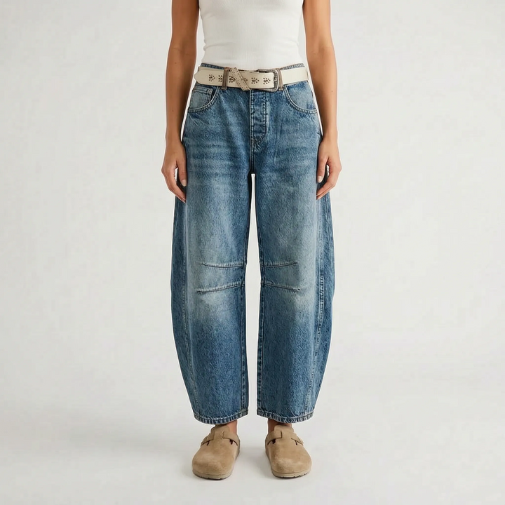 Women's cropped wide-leg jeans with curved legs and knee seam detailing