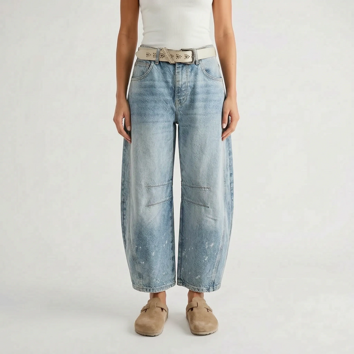 Women's cropped wide-leg jeans with curved legs and knee seam detailing