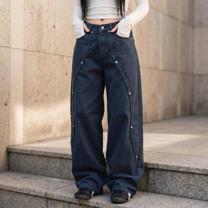 Women's dark navy high-waisted wide-leg jeans with overlapping front panels