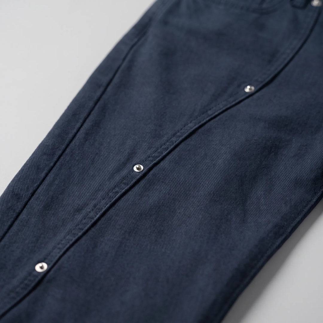 Women's dark navy high-waisted wide-leg jeans with overlapping front panels