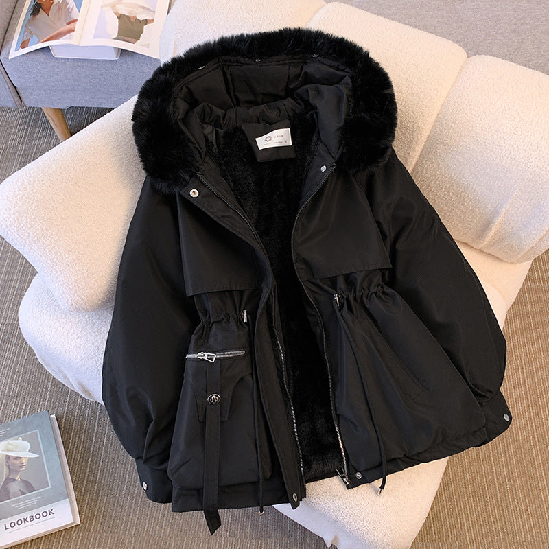 Women's hooded winter parka with fur trim and drawstring waist