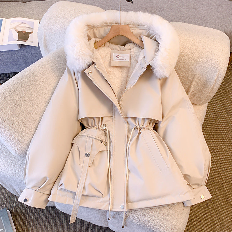 Women's hooded winter parka with fur trim and drawstring waist