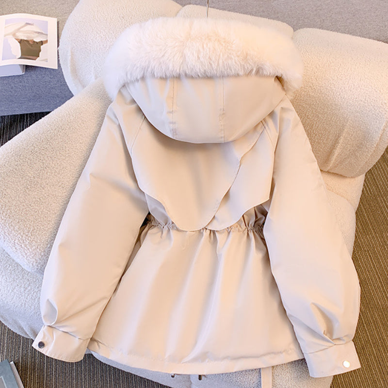 Women's hooded winter parka with fur trim and drawstring waist