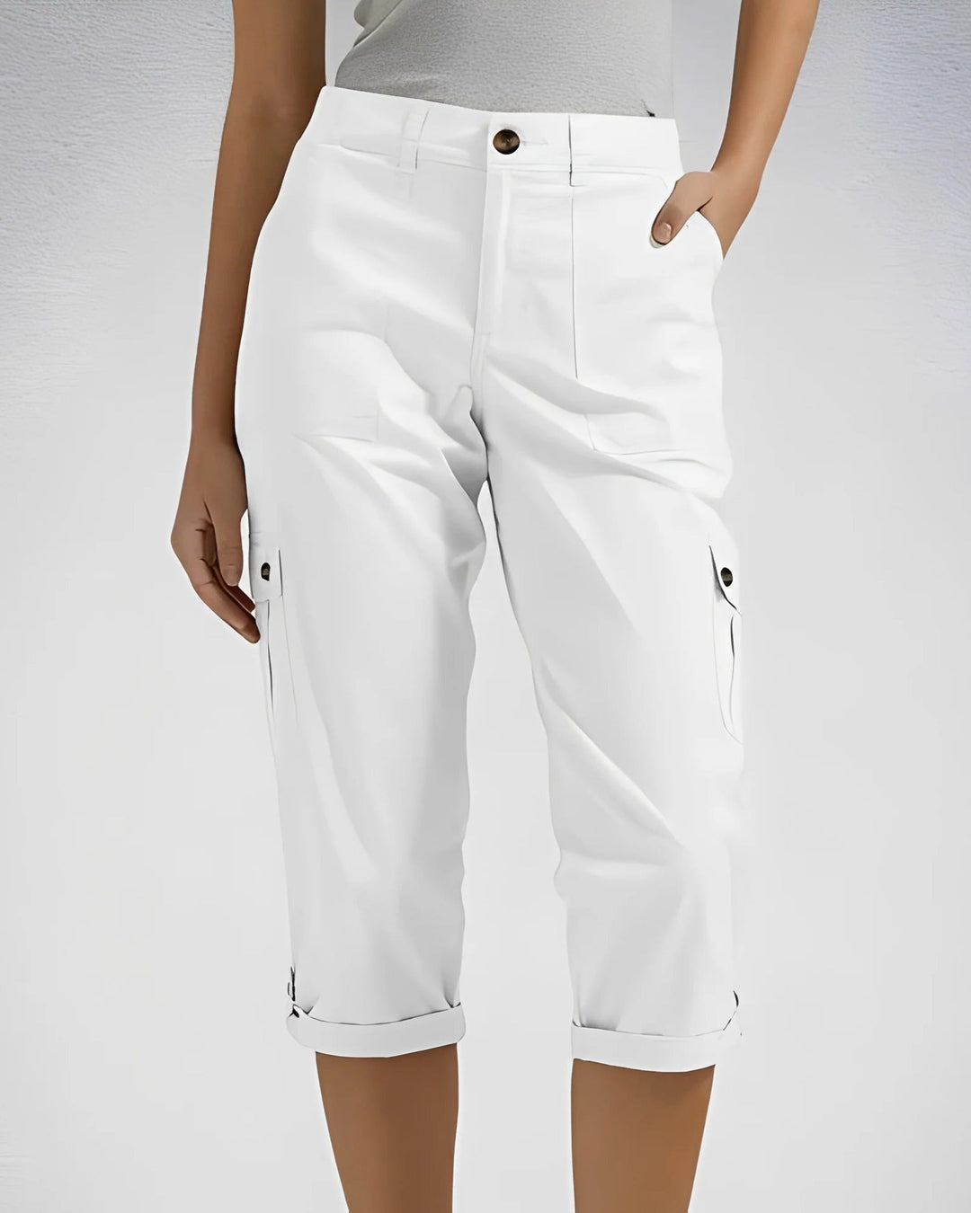 Women's cropped cargo trousers with cuffed hems and multiple pockets