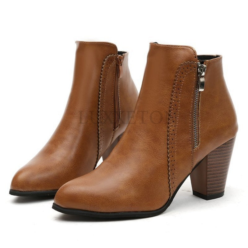 Women's heeled ankle boots with side zipper and almond toe