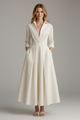 Women's collared midi dress with plunging V-neckline and full pleated skirt