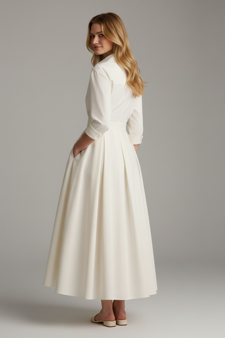 Women's collared midi dress with plunging V-neckline and full pleated skirt