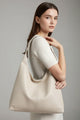 Women's oversized shoulder tote bag with a spacious smooth finish