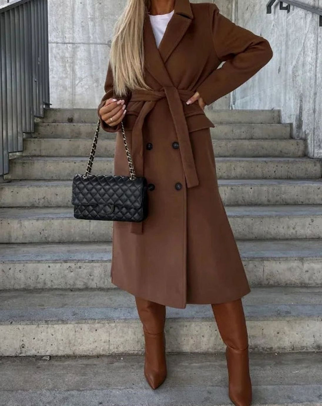 Women's long coat with notched lapel, button front, long sleeves and front pockets