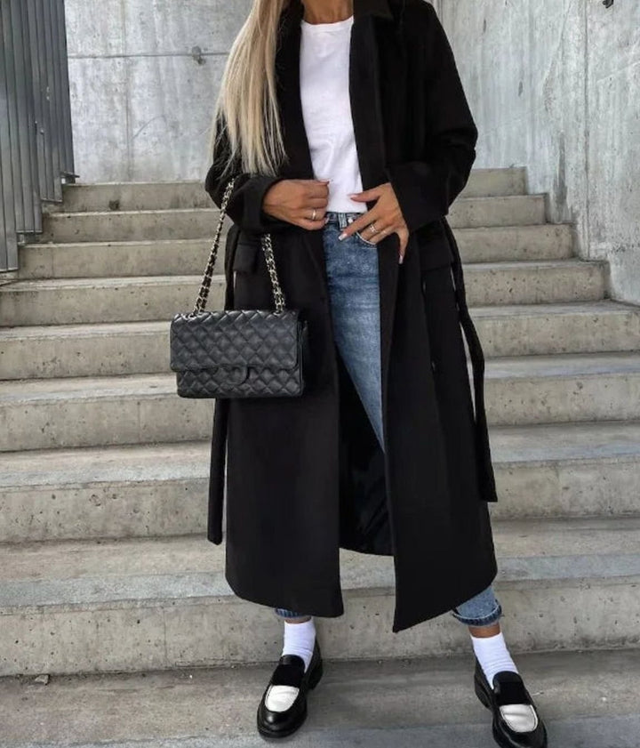 Women's long coat with notched lapel, button front, long sleeves and front pockets