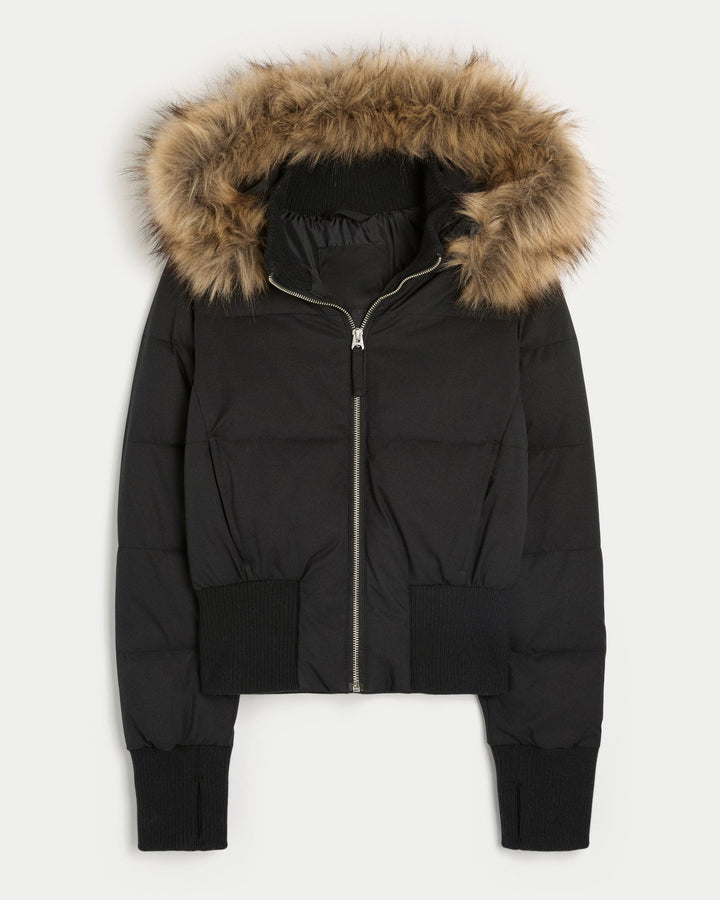 Women's quilted hooded jacket with fur-trimmed hood and ribbed cuffs