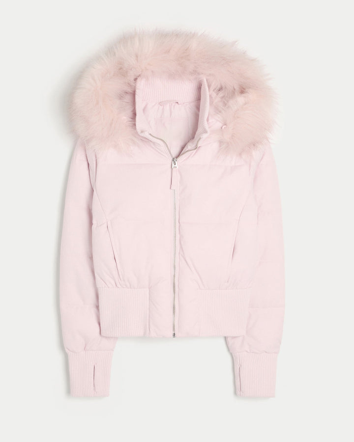 Women's quilted hooded jacket with fur-trimmed hood and ribbed cuffs