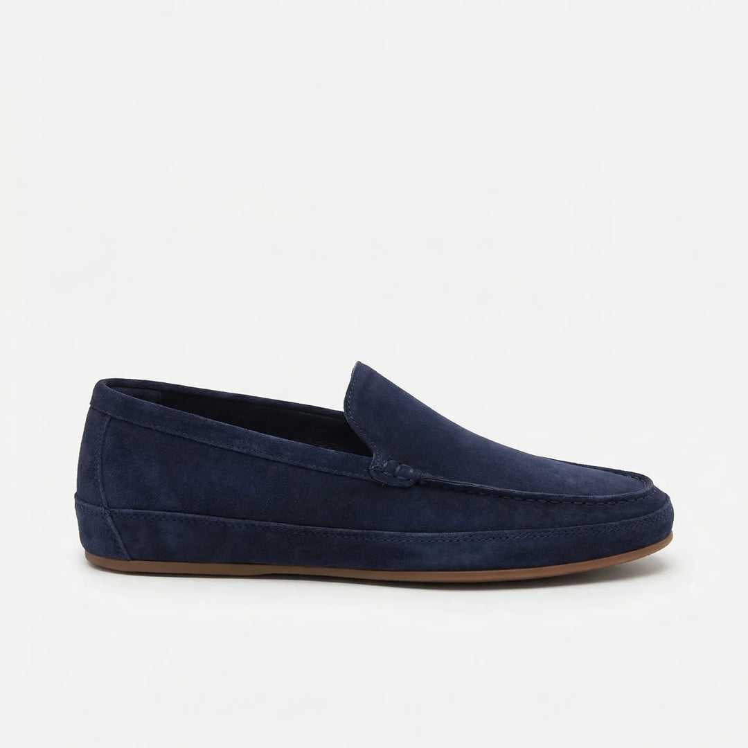 Men's slip-on moc toe loafers with stitched trim and lugged soles