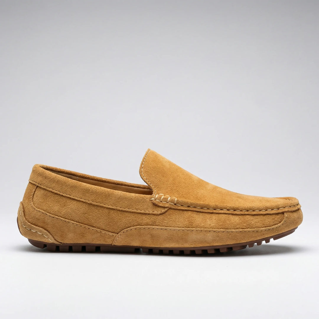 Men's slip-on moc toe loafers with stitched trim and lugged soles