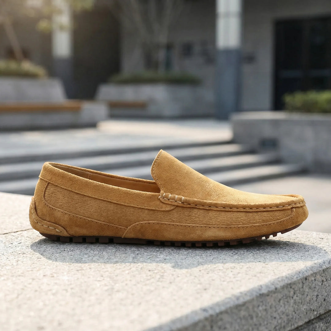 Men's slip-on moc toe loafers with stitched trim and lugged soles