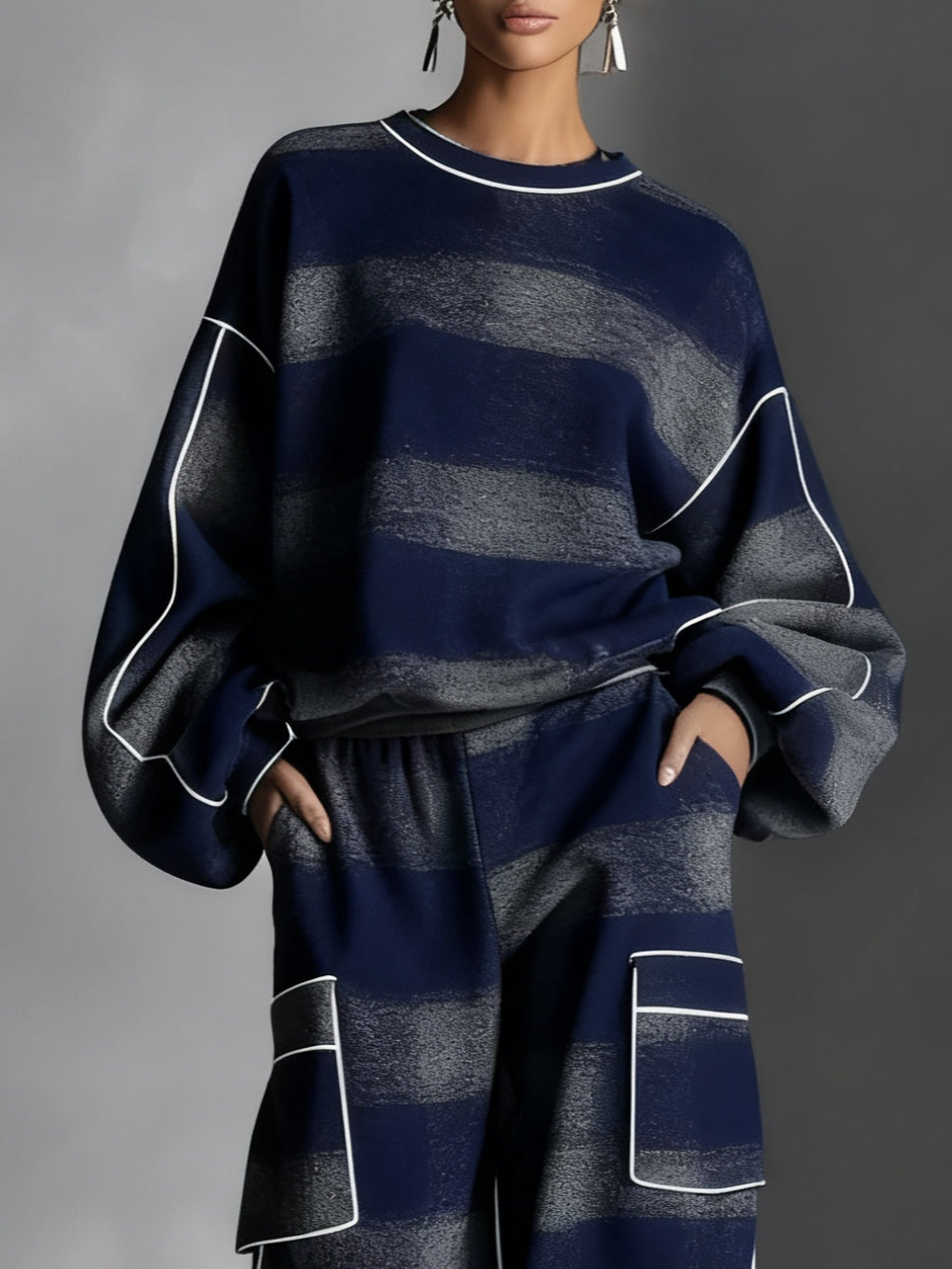 Women's striped sweatshirt and wide-leg trousers set with contrast piping