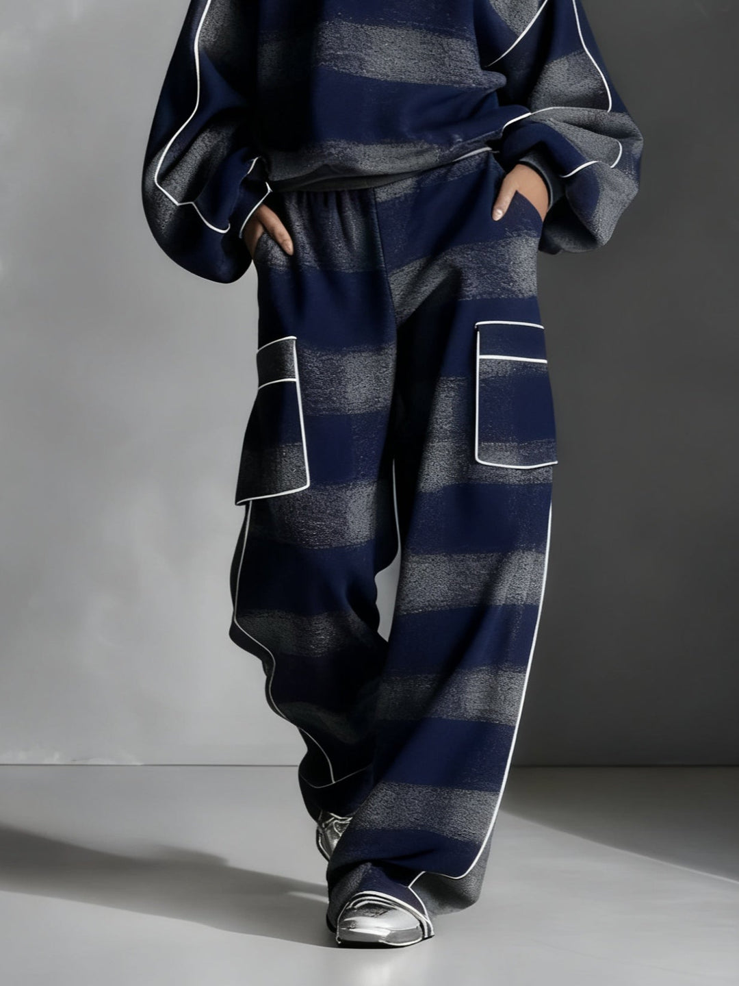 Women's striped sweatshirt and wide-leg trousers set with contrast piping