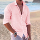 Men's long sleeve button-front shirt in white and black, shown on beach, worn open with relaxed fit.