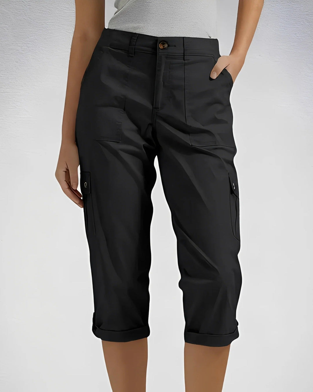 Women's cropped cargo trousers with cuffed hems and multiple pockets