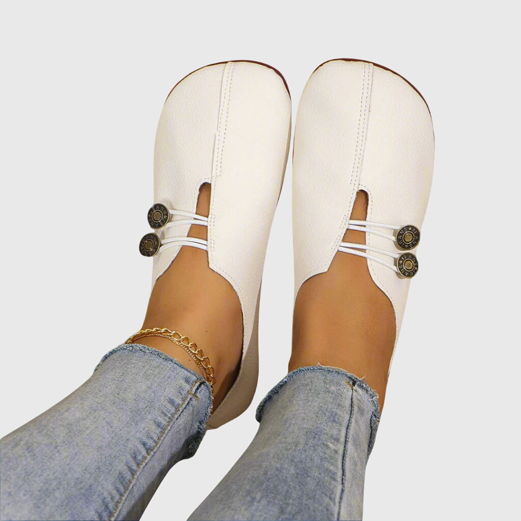 Women's lace-up ballet flats with round toes and button details