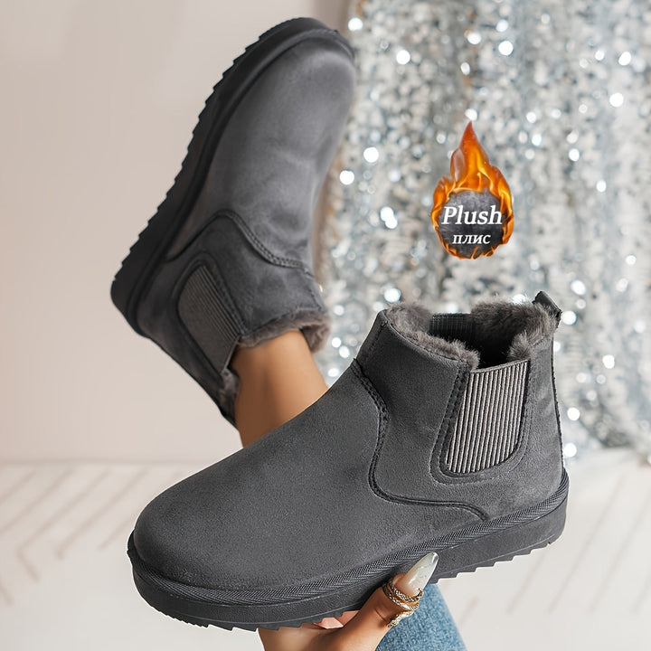 Women's winter ankle boots with faux fur lining and elastic side panels