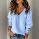 Women's ribbed V-neck jumper with long sleeves and button cuffs