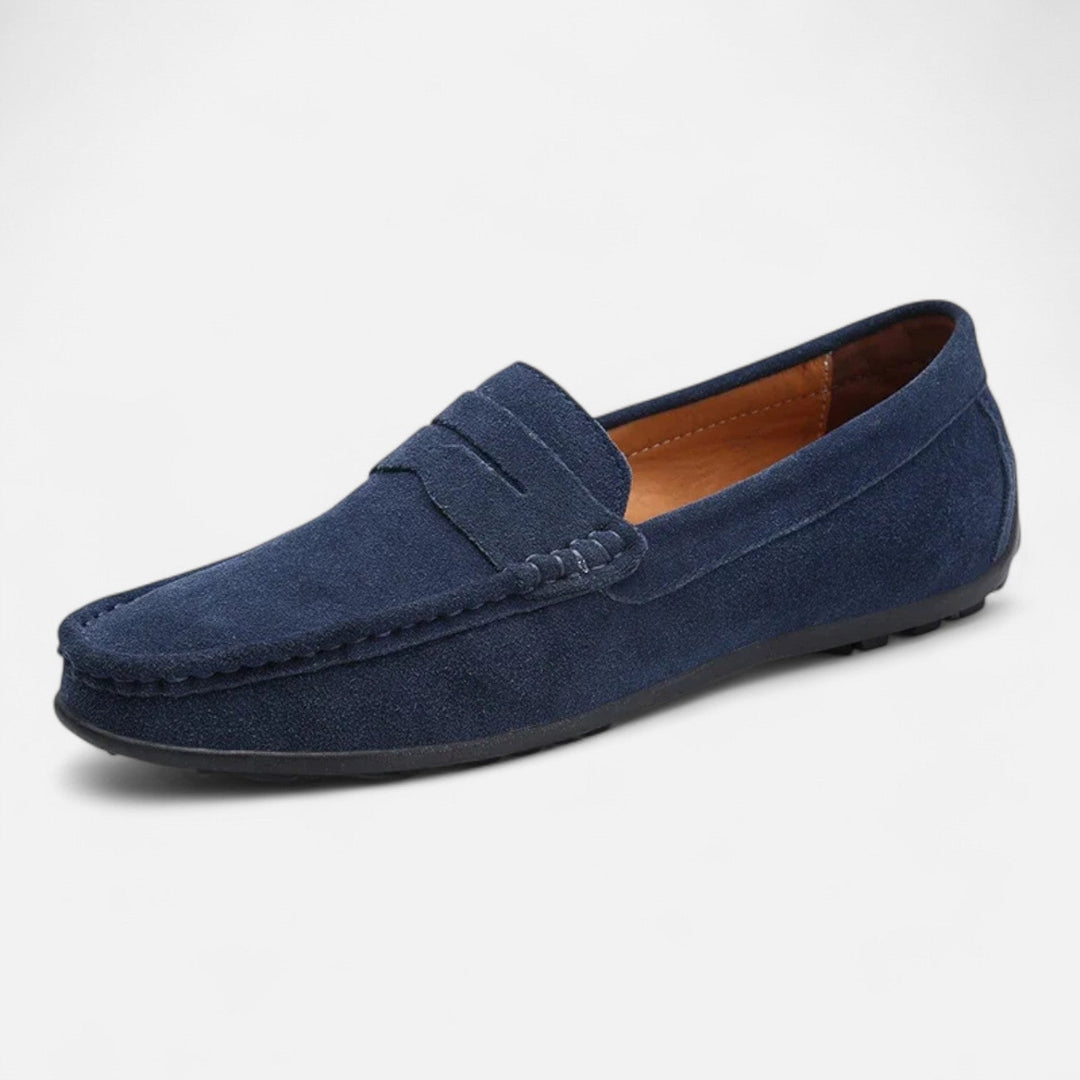 Men's penny loafer with moc toe stitching and low heel