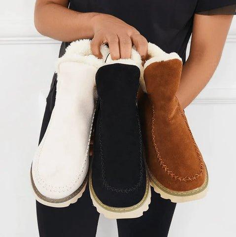 Women's fur-trimmed slip-on ankle boots with platform soles