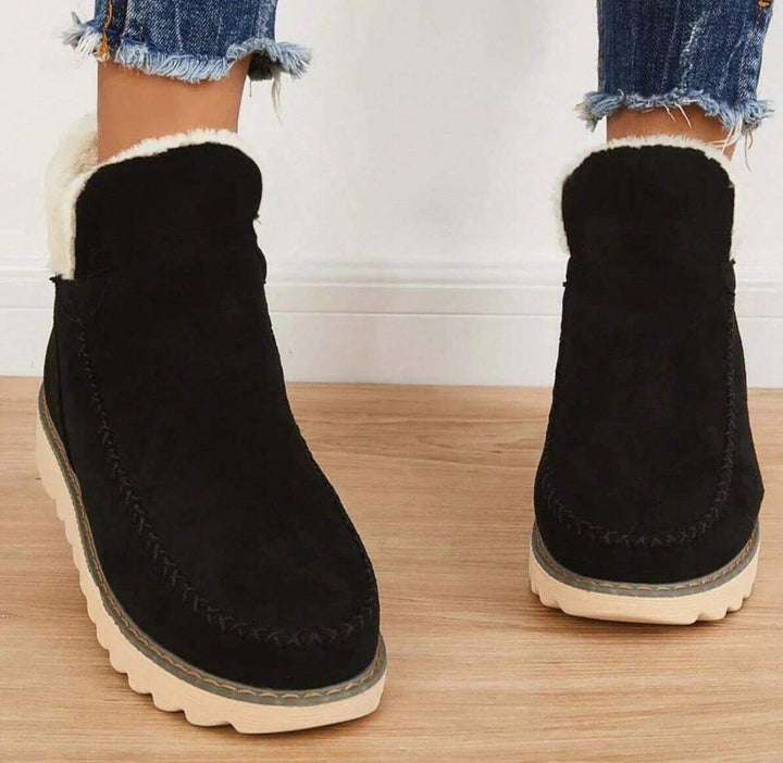 Women's fur-trimmed slip-on ankle boots with platform soles