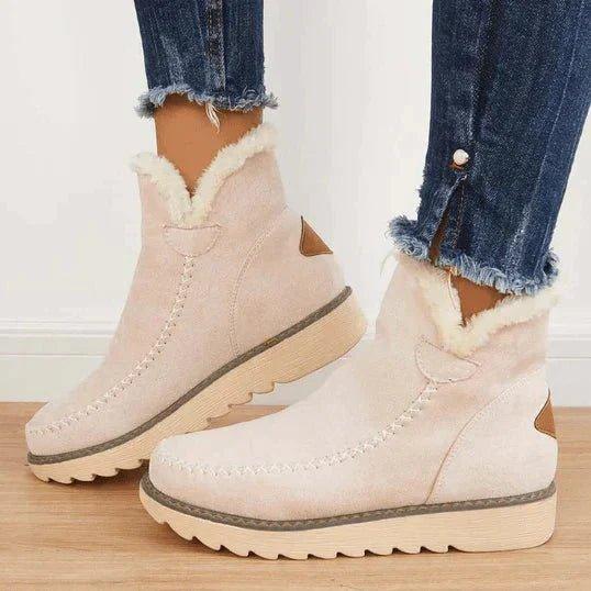Women's fur-trimmed slip-on ankle boots with platform soles