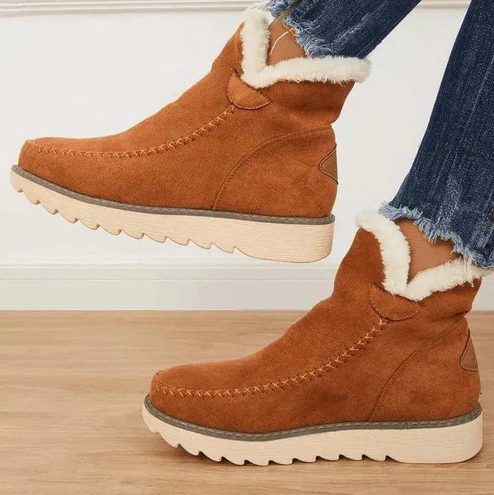 Women's fur-trimmed slip-on ankle boots with platform soles