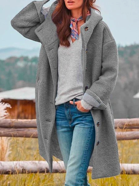 Women's long hooded coat with button front and side pockets