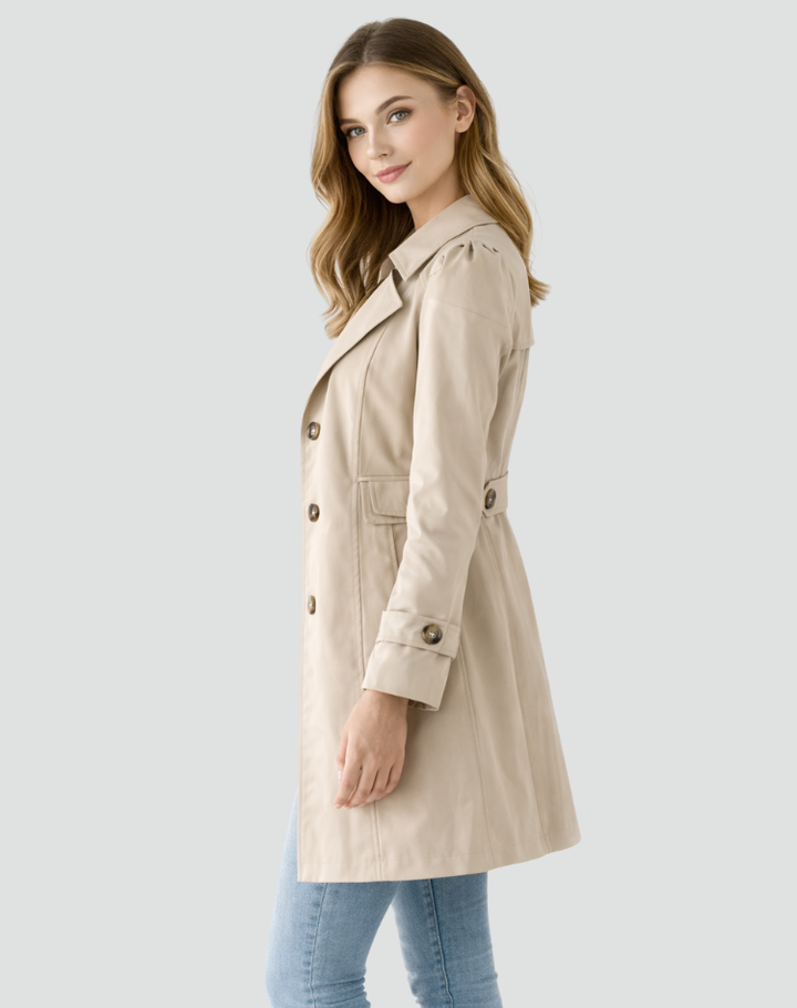 Women's knee-length trench coat with notched lapels, long sleeves and button front